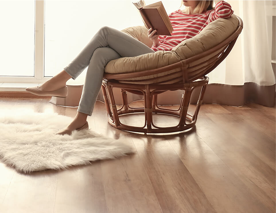 A woman sitting reading a book